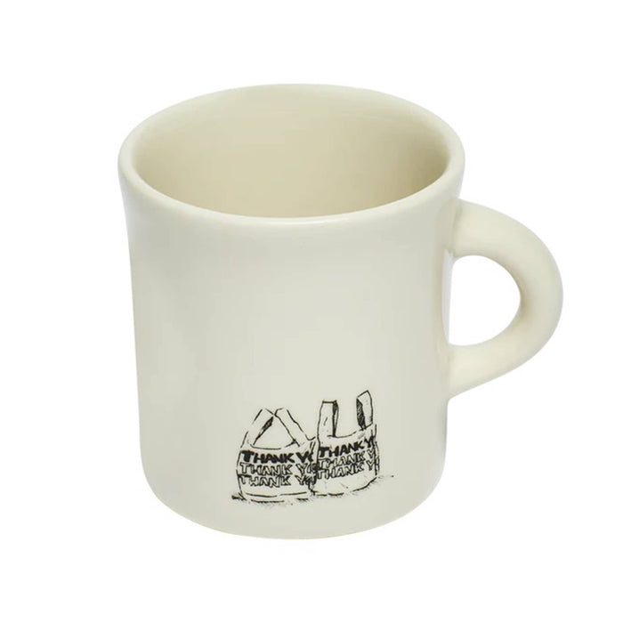 Back view of a white mug with an illustration in black of take out bags, on a white background.