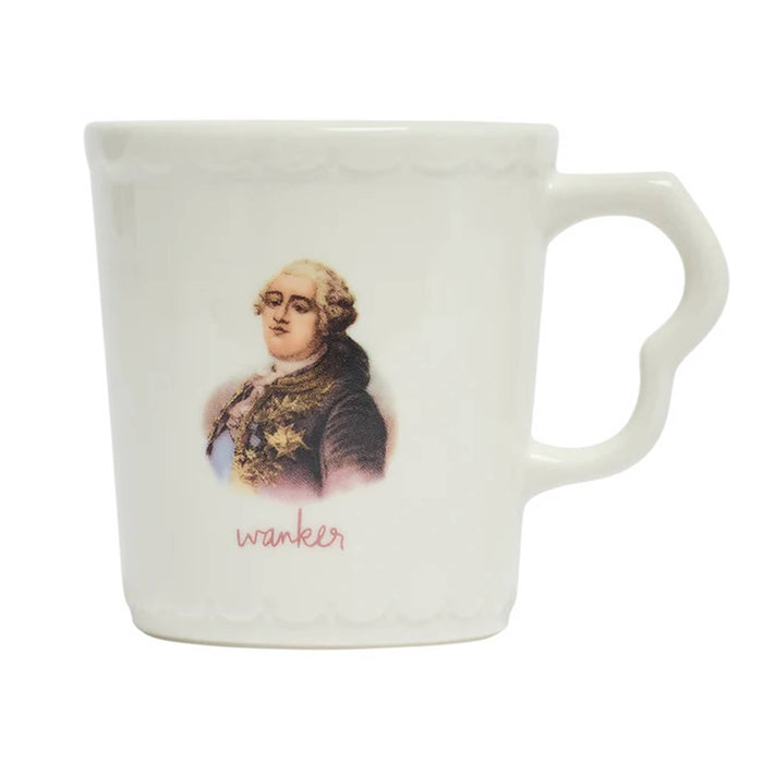 White stoneware mug with an old-timey portrait and the word 'wanker' printed below, front view, on a white background.