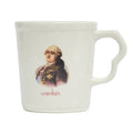 White stoneware mug with an old-timey portrait and the word 'wanker' printed below, front view, on a white background.