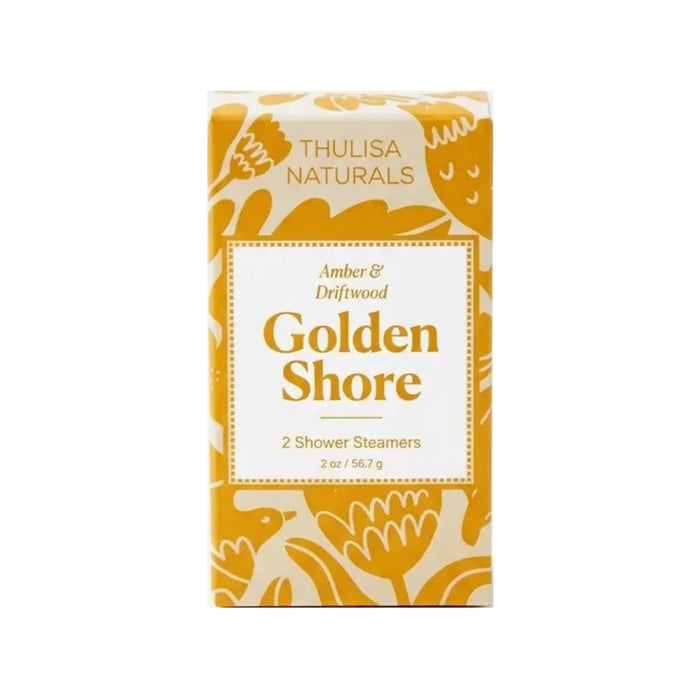 Thulisa Naturals Golden Shore shower steamers in golden yellow and white botanical print packaging, front view, on a white background.