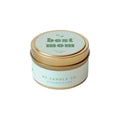 Candle in a gold tin with green label and 'best mom' text on the lid against a white background.