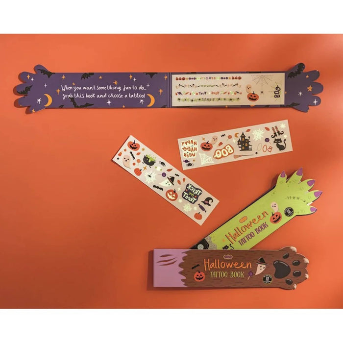 Four Halloween-themed temporary tattoo books are arranged on a solid orange background. The bookmarks feature spooky illustrations and text.
