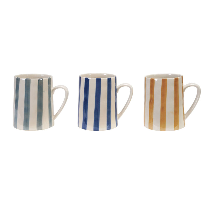 Three stoneware mugs with striped patterns on a white background.