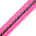 A very bright and fluorescent hot pink zipper tape with midnight rainbow coil teeth.