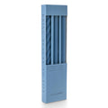 A tall rectangular box of ILLUME assorted taper candles in blue, shown on a clean white background. The box has a clear window revealing the tapers inside.