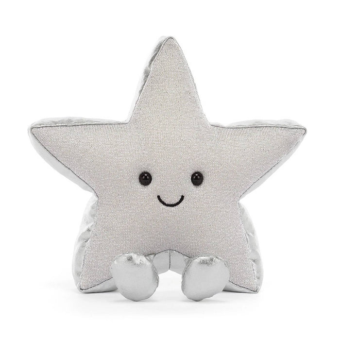 A silver glittery star-shaped plush toy with a smiling embroidered face and small feet, front view, photographed on a clean white background.