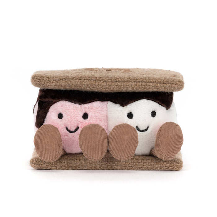 Plush toy resembling graham crackers with pink and white marshmallows with chocolate, front view, on a white background.