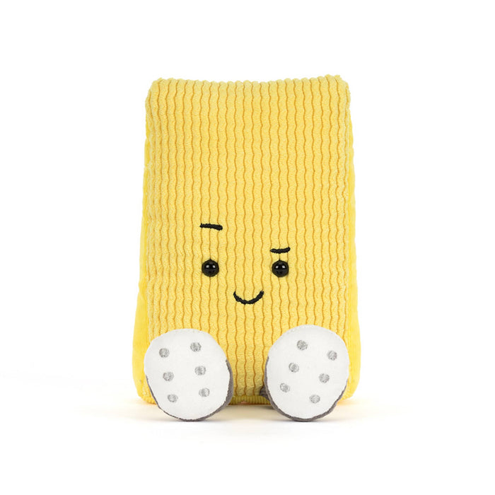Soccer yellow card plush toy with a raised eyebrow and smile, front view, on a white background.