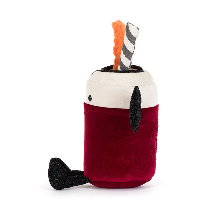 A plush toy shaped like a vampire cocktail in a can-shaped glass, with a deep red body, white rim, black wings, black feet, a striped straw, and an orange slice decoration, side view on a white background.