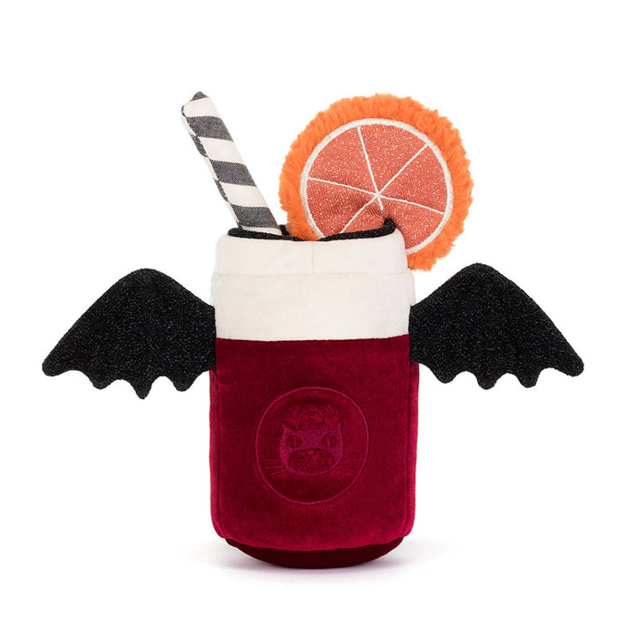 A plush toy shaped like a vampire cocktail in a can-shaped glass, with a deep red body, white rim, black wings, black feet, a striped straw, and an orange slice decoration, back view on a white background.