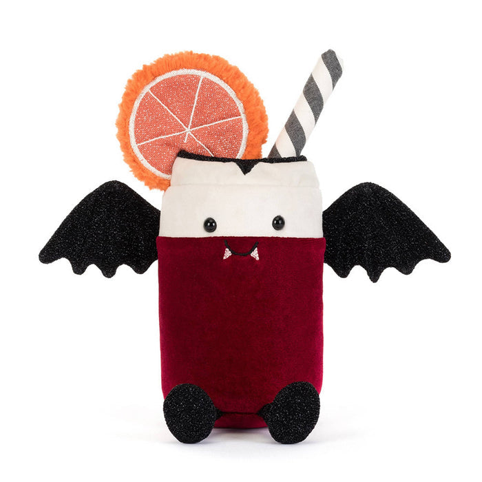 A plush toy shaped like a vampire cocktail in a can-shaped glass, with a deep red body, white rim, black wings, black feet, a striped straw, and an orange slice decoration, front view on a white background.