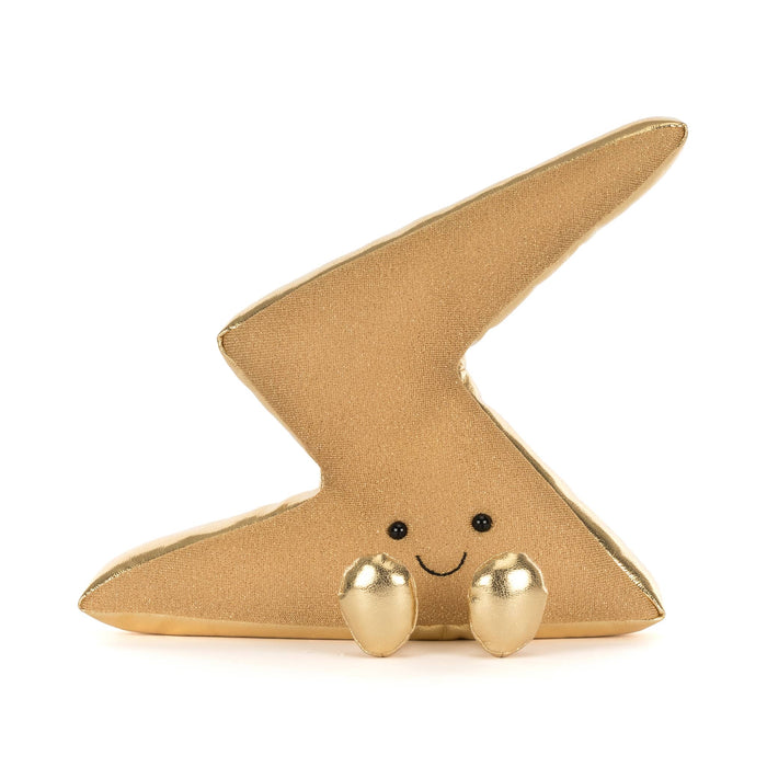 Plush toy resembling a gold lightning bolt with smiling face, front view, on a white background.