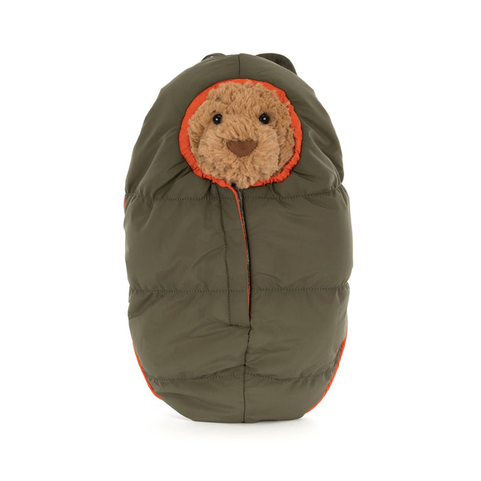 Jellycat Bartholomew Bear plush in a sleeping bag, front view, on a white background.