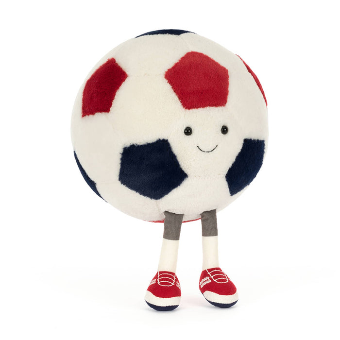 Plush toy soccer ball in red, white, and blue with smiling face, front angle view, standing on a white background.