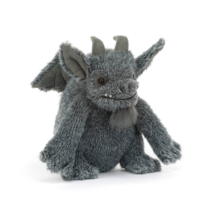 A gray plush gargoyle toy with large pointed ears, small horns, and a stitched smiling face, front angle view, against a clean white background.