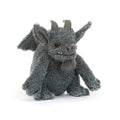 A gray plush gargoyle toy with large pointed ears, small horns, and a stitched smiling face, front angle view, against a clean white background.