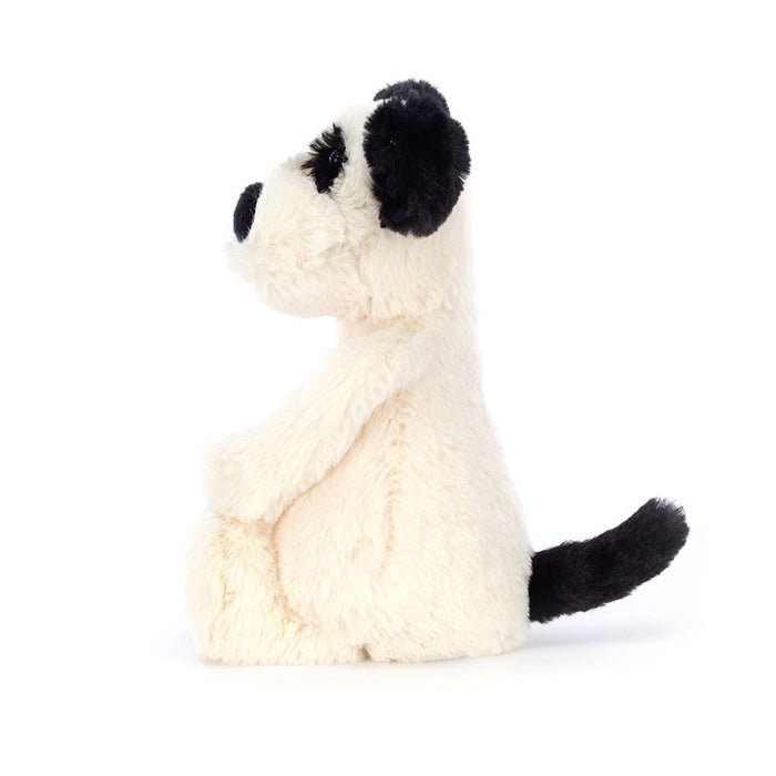 Jellycat bashful black & cream puppy small plush toy, side view, on a white background.