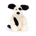 Jellycat Medium Bashful Rufferty black and cream puppy plush toy, front angle view on a white background.