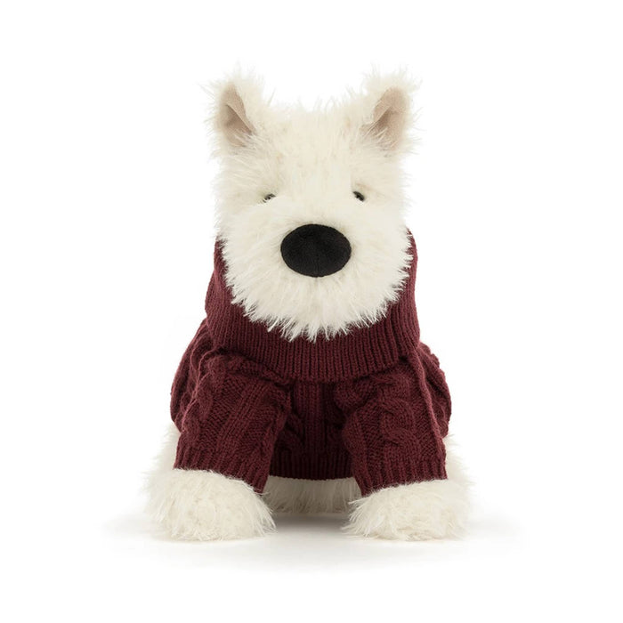 A plush white dog wearing a burgundy cable-knit sweater, front view on a plain white background.