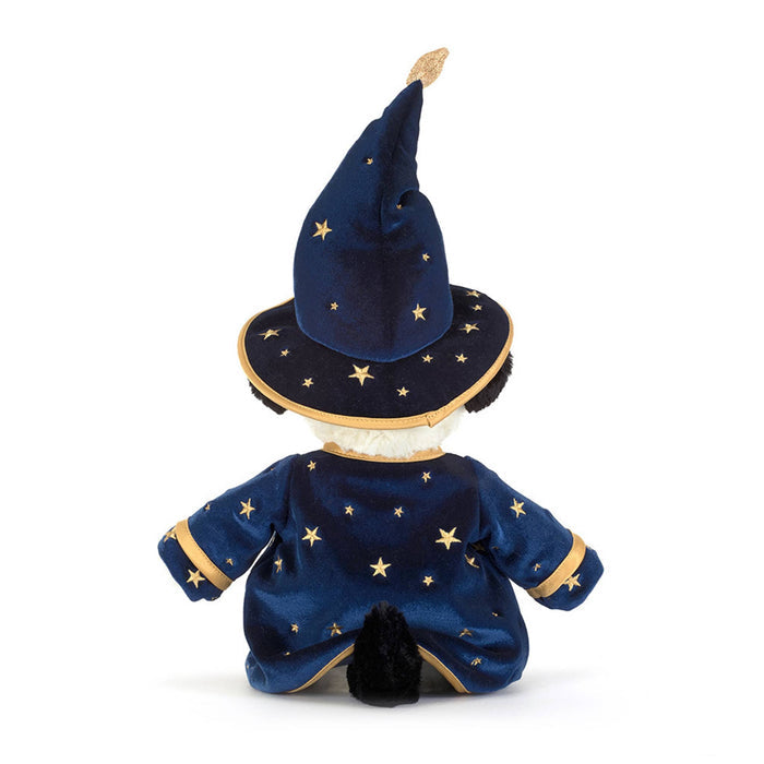 A plush dog toy dressed as a wizard, featuring a navy blue velvet robe and pointed hat with gold star patterns and trim, back view, against a plain white background.