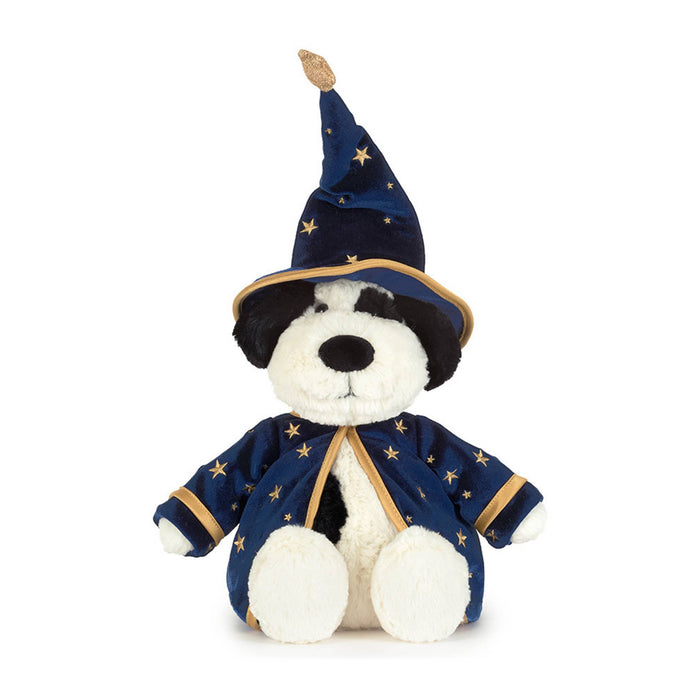 A plush dog toy dressed as a wizard, featuring a navy blue velvet robe and pointed hat with gold star patterns and trim, front view, against a plain white background.