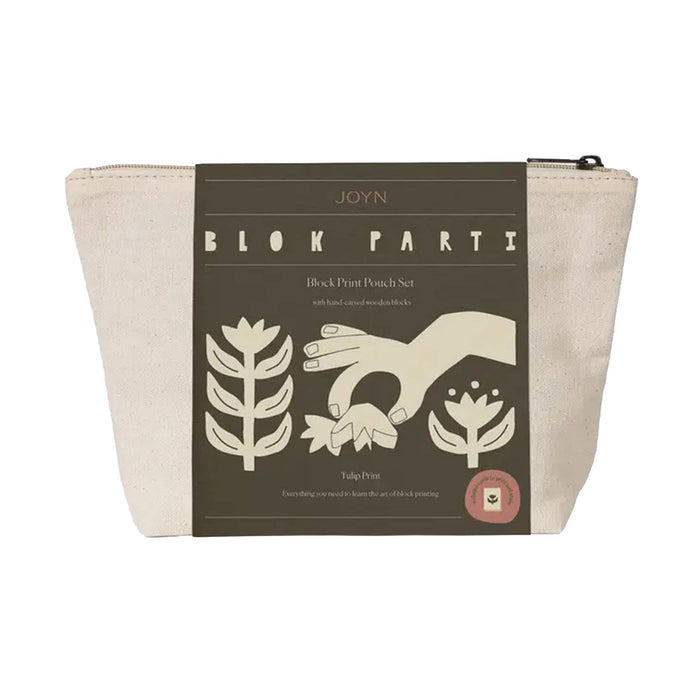 Front of JOYN Blok Parti Tulip Block Printing Pouch Set, featuring an off-white canvas pouch with charcoal gray bellyband with cream-colored block printing illustrations of hands, flower and stem patterns, on a plain white background.