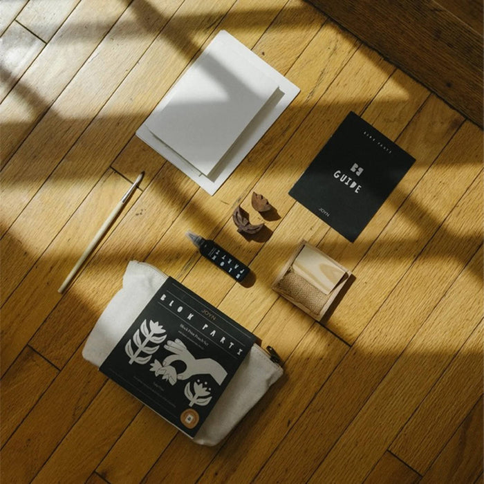 JOYN Blok Parti Tulip Pouch Block Printing Set contents including a cream canvas pouch, guide book, wood blocks, and ink tray.
