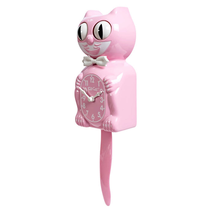 Pink cat-shaped wall clock with a long tail and eyes that move, left side angle view on a plain white background.