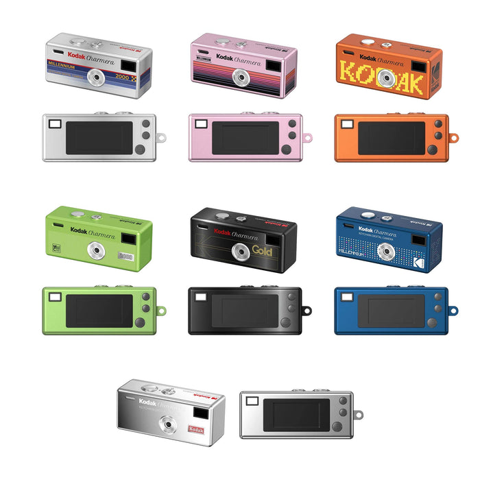 A grid of 7 Kodak Charmera mini digital cameras, front and back shown in various color options, including silver, pink, orange, green, black, and blue, on a plain white background.