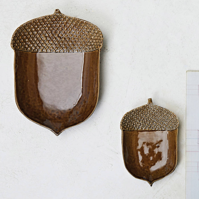Creative Co-op Small and Large Stoneware Acorn Shaped Plates with brown reactive glaze.
