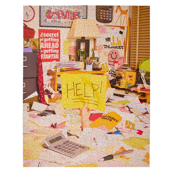 Colorful puzzle with a chaotic office scene, including a desk with a 'Help!' sign.