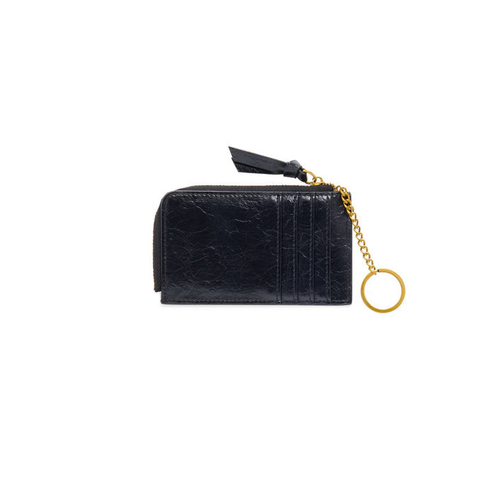 Back of a black faux leather zip-around card holder wallet with a gold chain and keyring, card slots, and a black leather zip pull tag, shown on a plain white background.