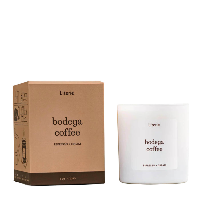 Literie Candles Bodega Coffee scented soy and coconut wax candle in white matte glass vessel beside two-tone brown box, on a white background.