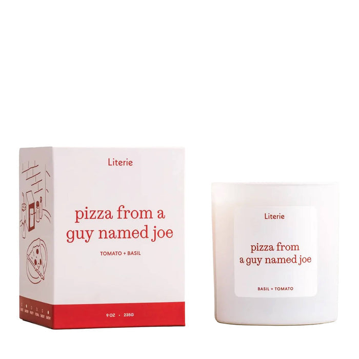 Literie Candles Pizza From a Guy Named Joe basil and tomato scented soy and coconut wax candle in white matte glass vessel beside a red and white box, on a white background.