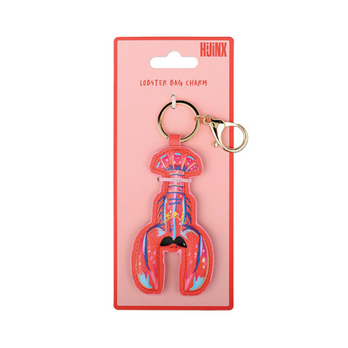 A lobster-shaped bag charm by HIJINX, attached to a pink retail card with a gold-tone key ring and clasp, shown on a plain white background.