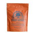 Forest Bathing bath salt soak in an orange resealable stand-up pouch with blue printed graphics and text, photographed on a plain white background.