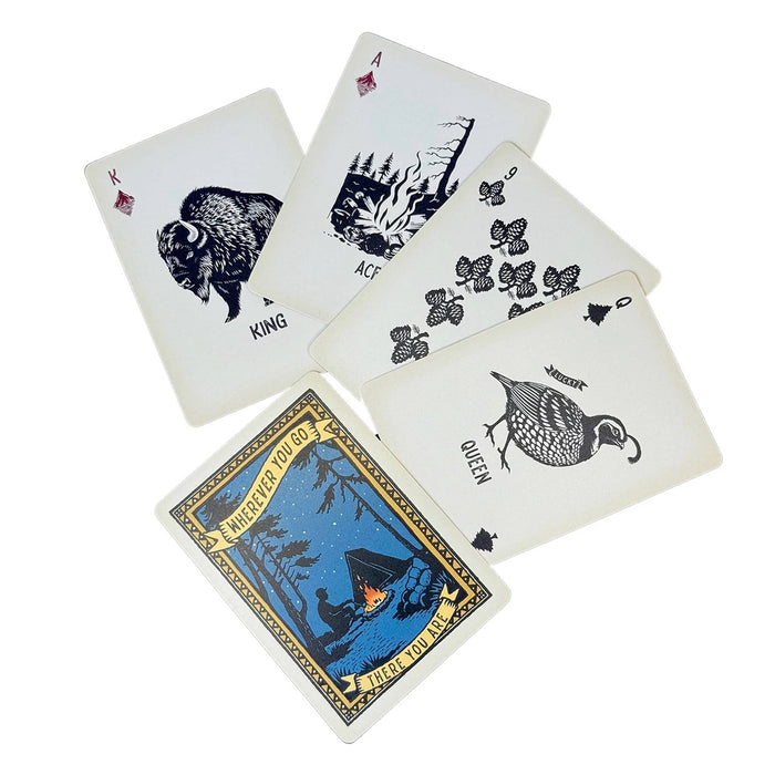 Set of playing cards with unique designs on a white background.