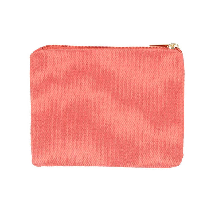 Back of coin pouch with plain coral pink fabric and a gold zipper, on a white background.
