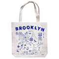 Tote bag with illustrations of Brooklyn landmarks and 'Brooklyn' text on a white background.