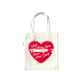 Cream tiny tote bag with a red heart design featuring a taxi and text on a white background.