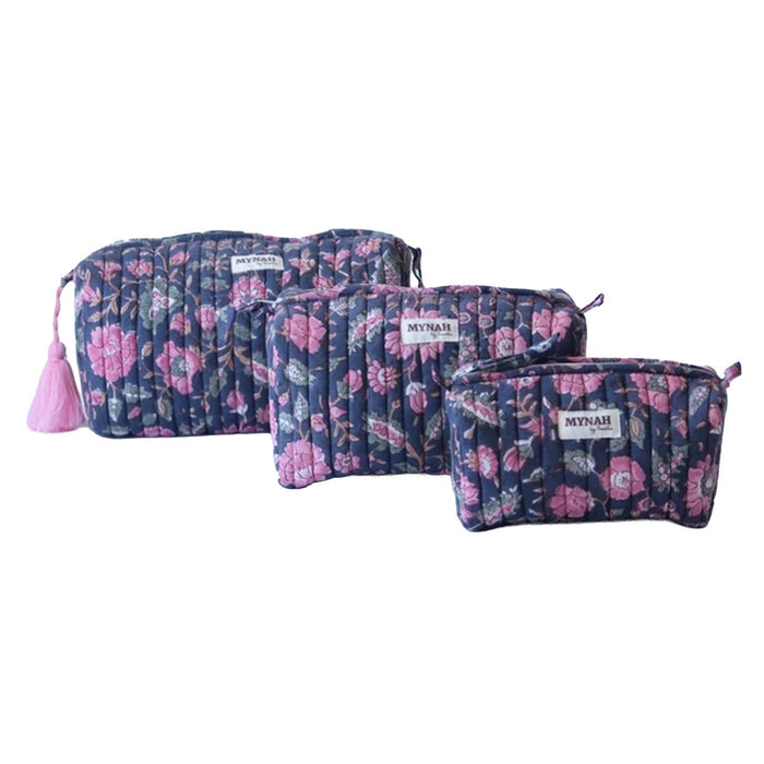 Large, medium, and small sized pink, green and navy blue floral-patterned pouches on a white background.