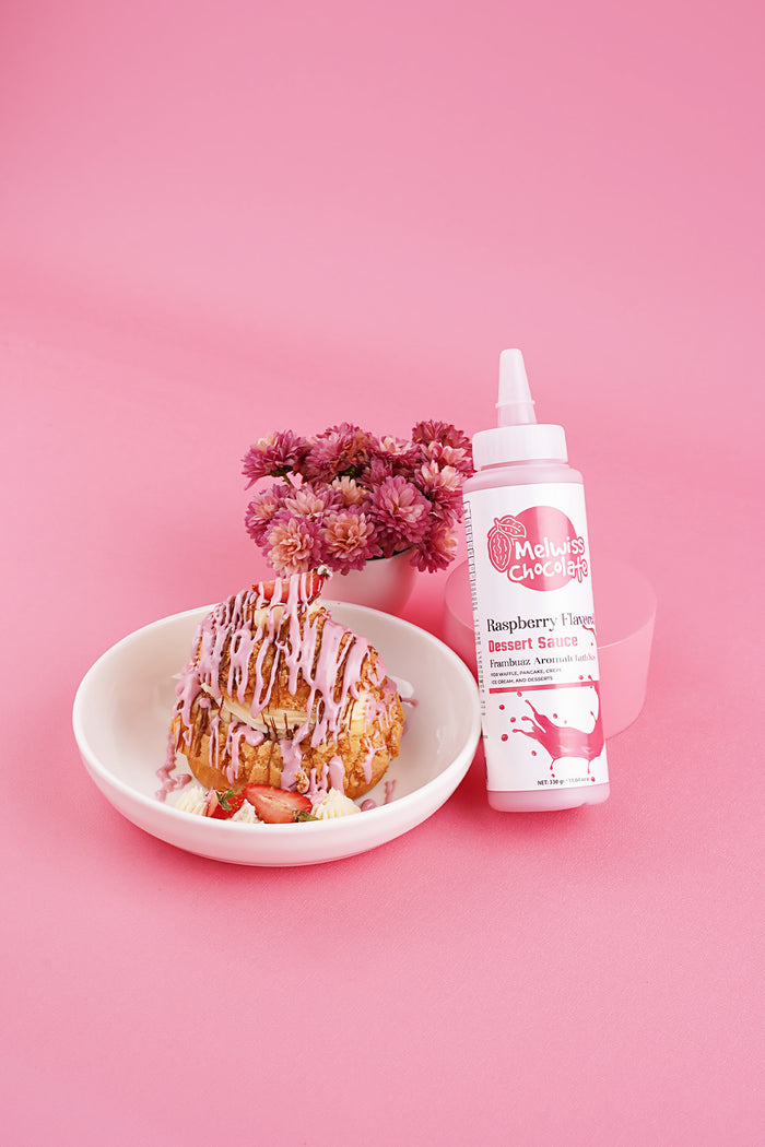 Meet your new favorite topping: Melwiss Chocolate Raspberry Flavored Dessert Sauce.