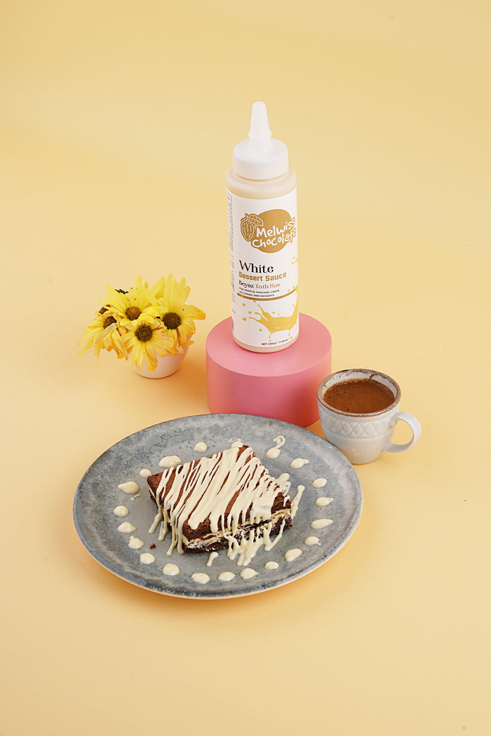 Discover a new way to top your favorite desserts with Melwiss Chocolate White Sweet Sauce.