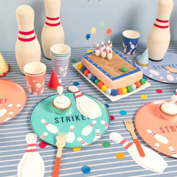 Meri Meri Bowling large paper party dinner plates in party setting.