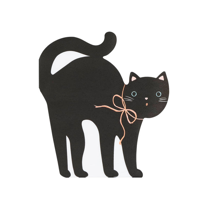 A black cat-shaped die-cut paper party napkin with a peach bow around its neck, blue eyes, and small pink nose and whiskers, shown on a plain white background.