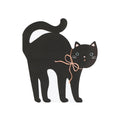 A black cat-shaped die-cut paper party napkin with a peach bow around its neck, blue eyes, and small pink nose and whiskers, shown on a plain white background.