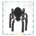 Honeycomb spiders Halloween decor in packaging, on a white background.
