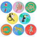 Set of 8 colorful large paper party dinner plates with tropical animal illustrations, on a white background.