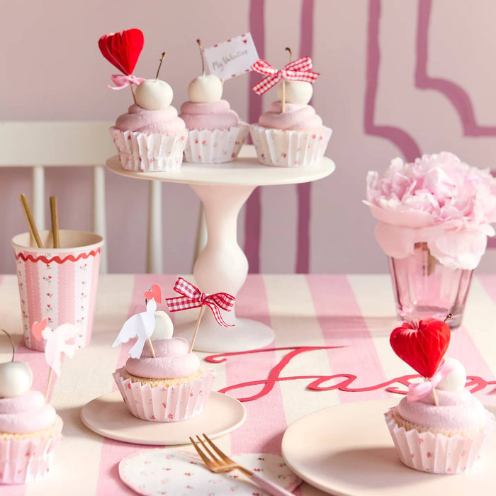 Meri Meri Lovebird Valentine's Day Cupcake Kit, finished cupcakes in a party setting.