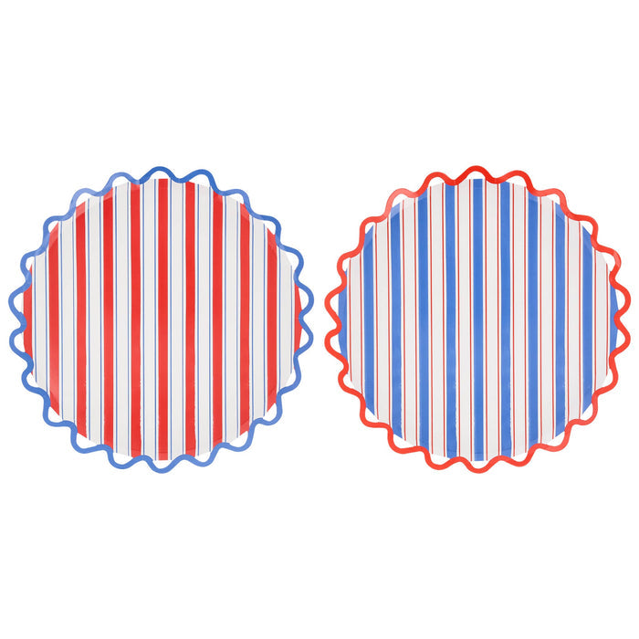 Two large red, white, and blue striped paper plates with wavy edges, on a white background.